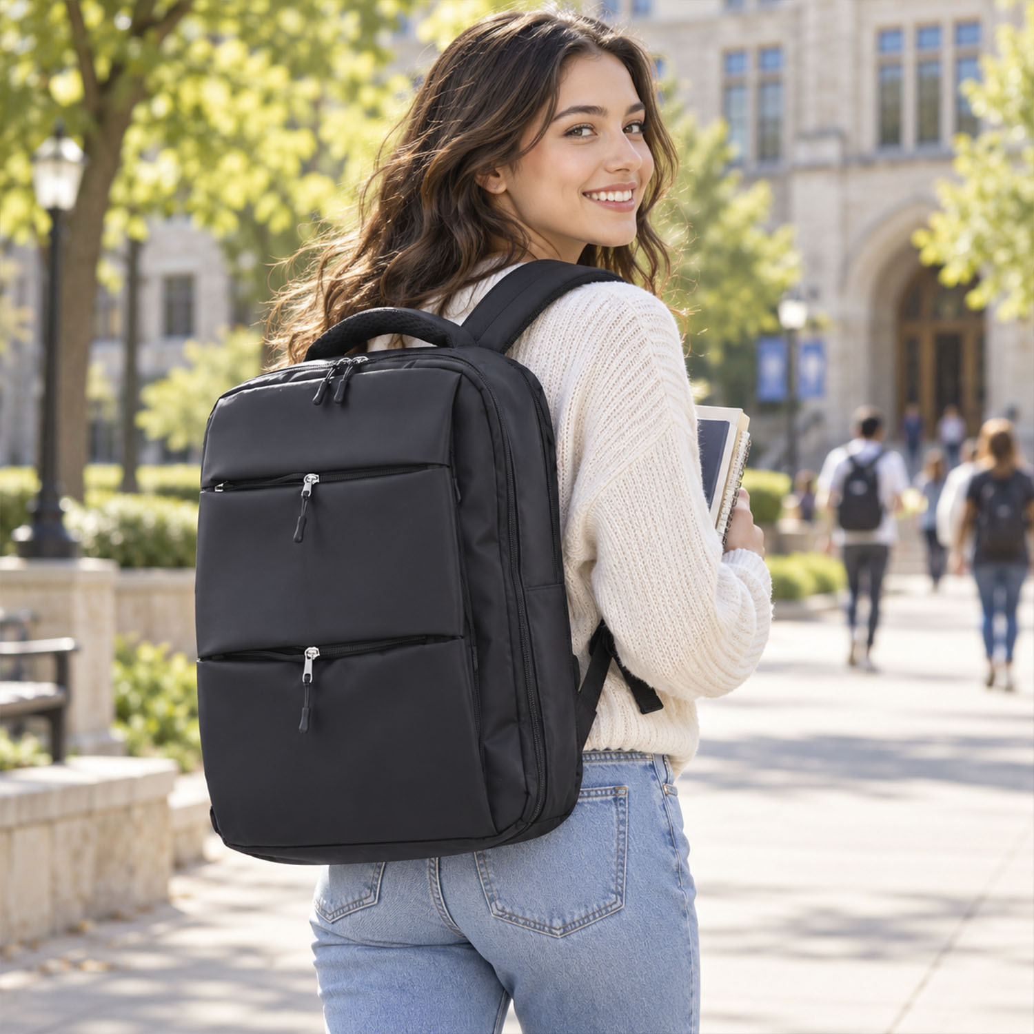Soft Padded Laptop Backpack Solid black fabric with a matte finish, Water-resistant synthetic material (nylon/polyester)